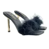 BLACK SANDAL WITH FUR AND METALLIC HEEL