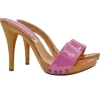 Fuchsia clogs and 12 cm heel